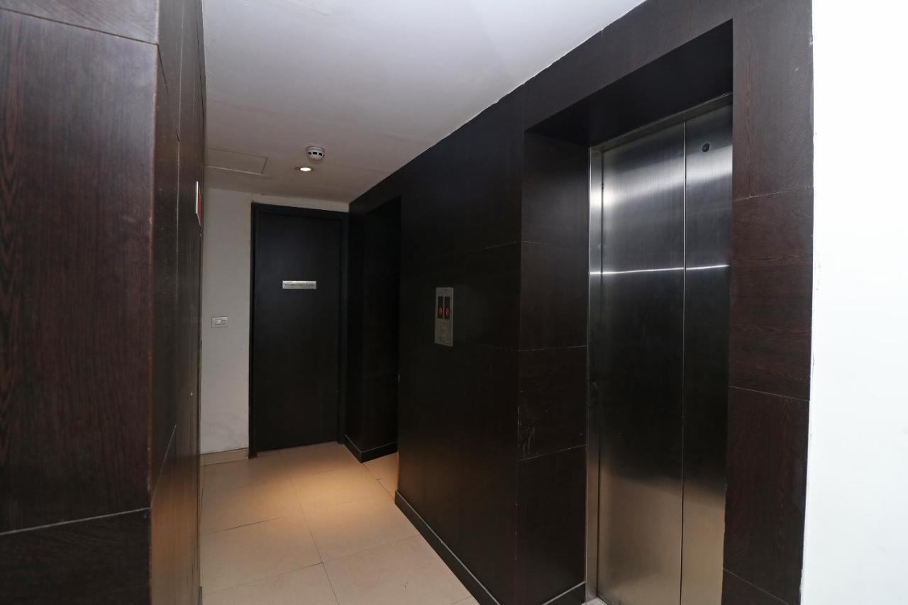 Capital O 19296 Joy Inn & Suites Bhiwadi Buitenkant foto